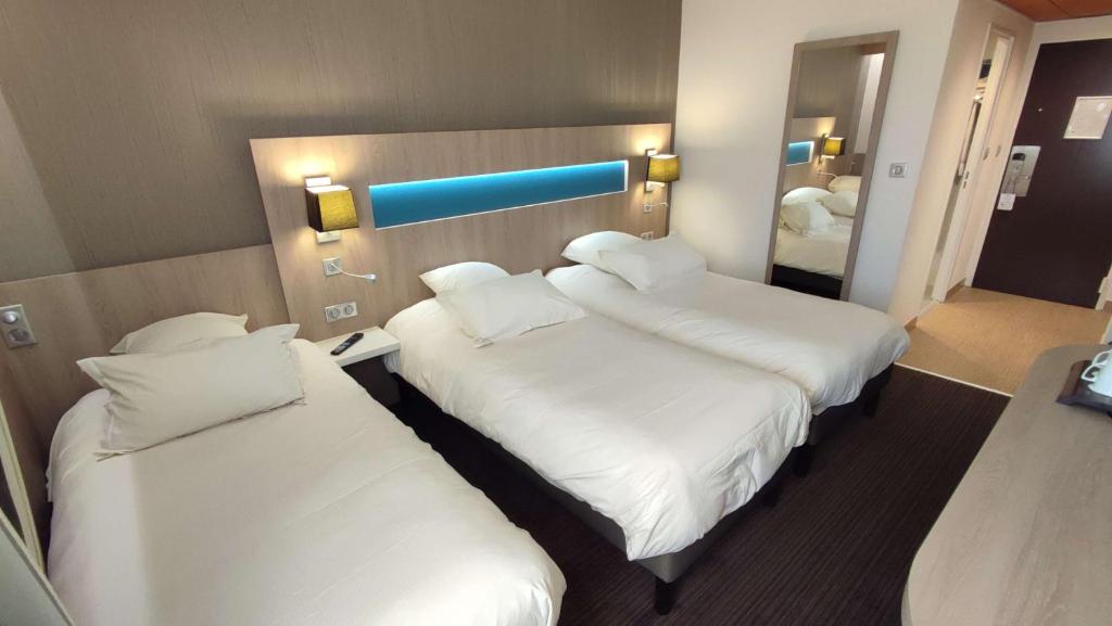 Postel nebo postele na pokoji v ubytování Best Western Marseille Aeroport