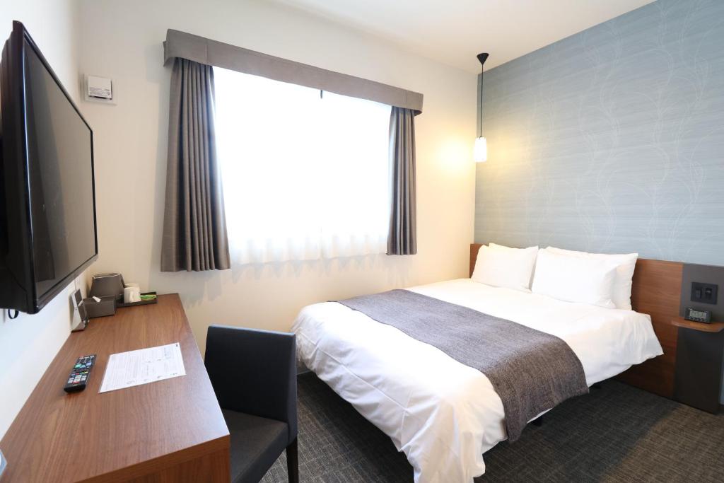 TV a/nebo společenská místnost v ubytování M's Hotel Nijojo Oike