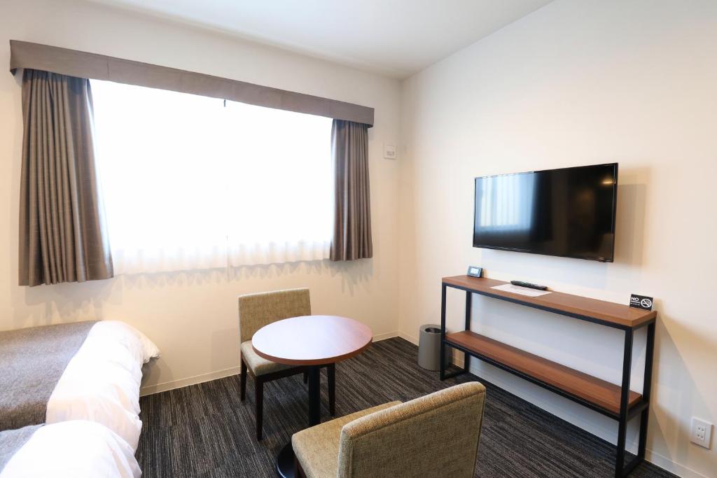 TV a/nebo společenská místnost v ubytování M's Hotel Nijojo Oike