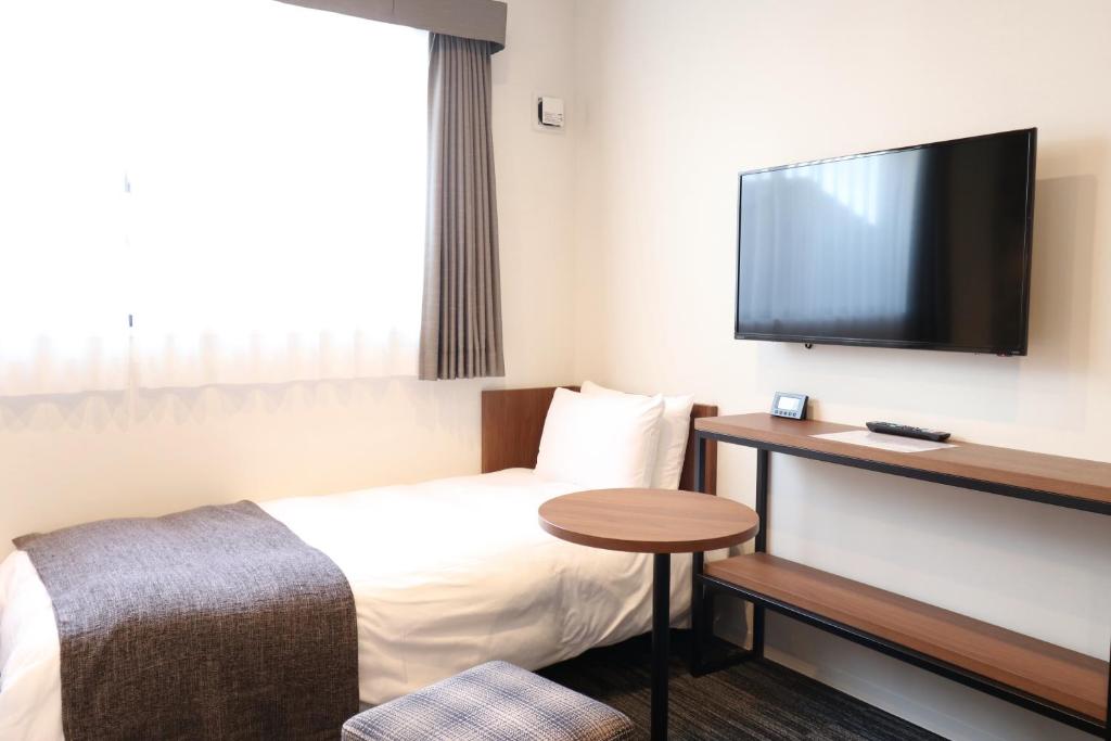 TV a/nebo společenská místnost v ubytování M's Hotel Nijojo Oike