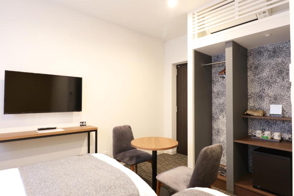 TV a/nebo společenská místnost v ubytování M's Hotel Nijojo Oike