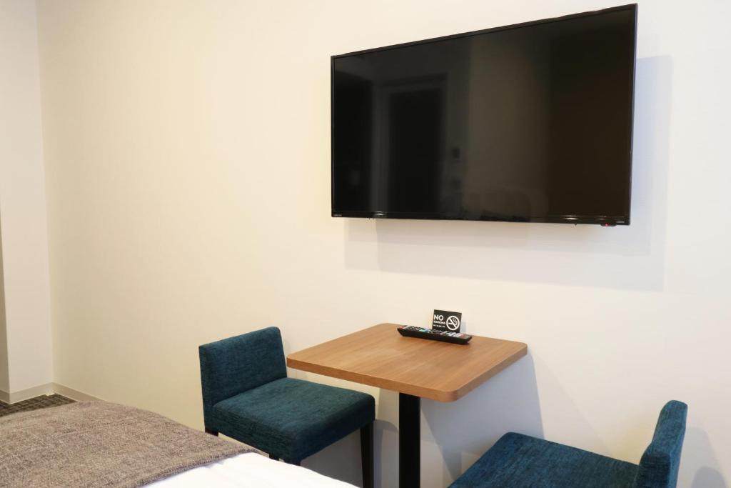 TV a/nebo společenská místnost v ubytování M's Hotel Nijojo Oike