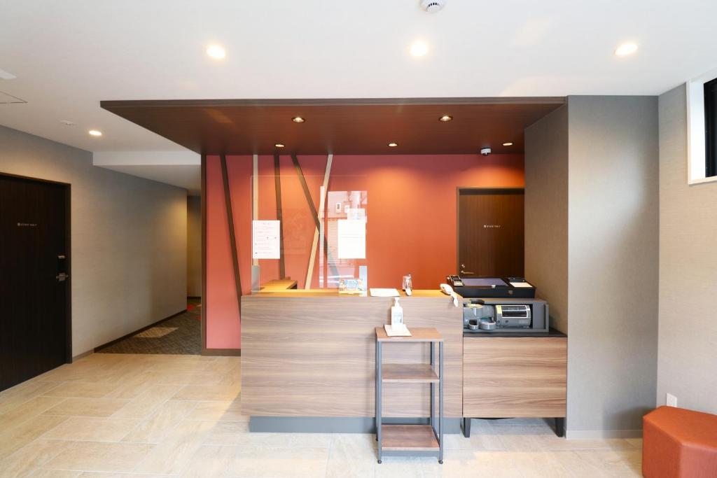 Kuchyň nebo kuchyňský kout v ubytování M's Hotel Nijojo Oike