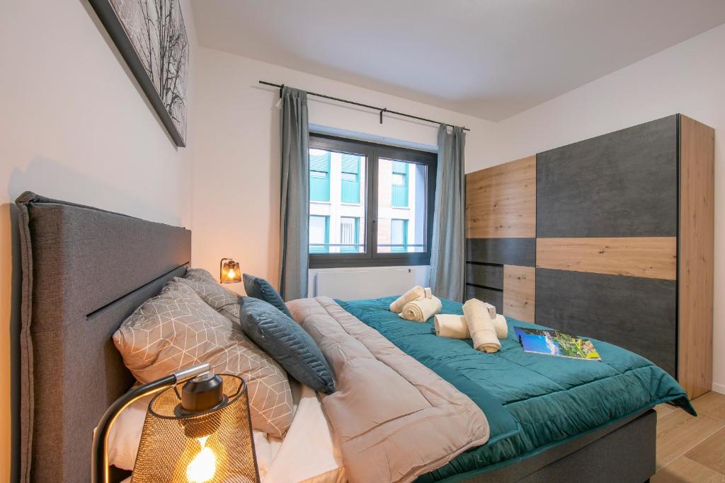 Postel nebo postele na pokoji v ubytování Boutique Apartments