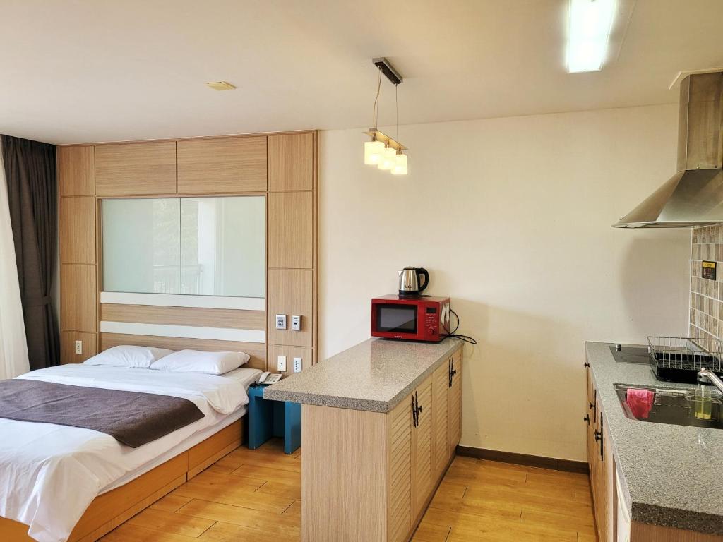 Kuchyň nebo kuchyňský kout v ubytování Amoureux Resort