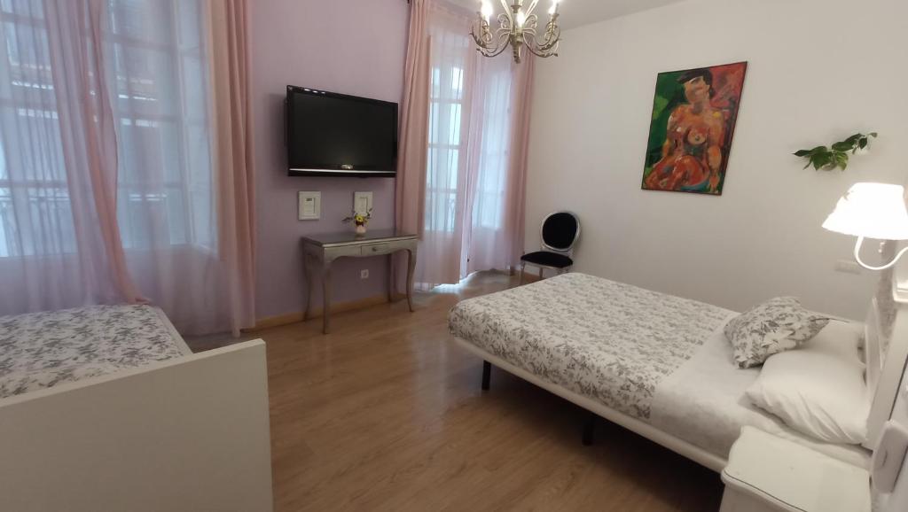 Posteľ alebo postele v izbe v ubytovaní Un Patio al Sur