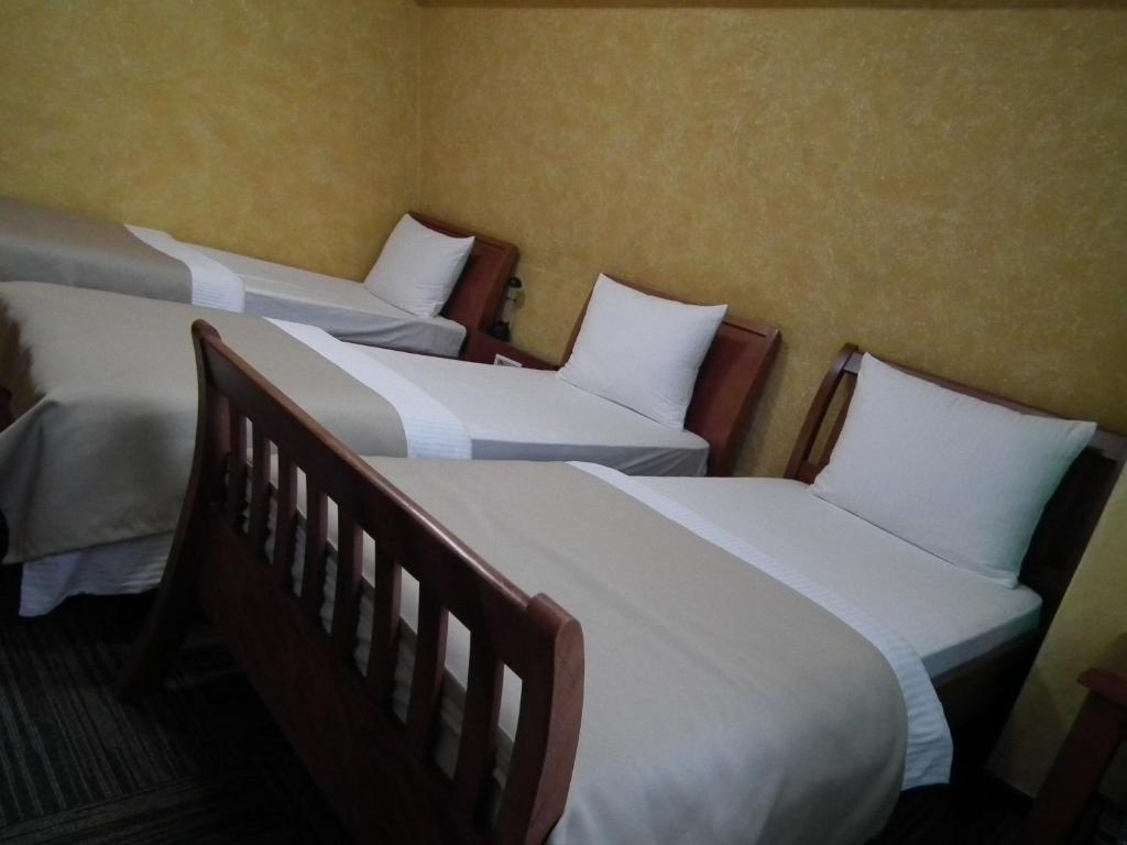 Postel nebo postele na pokoji v ubytování Hotel Kerber