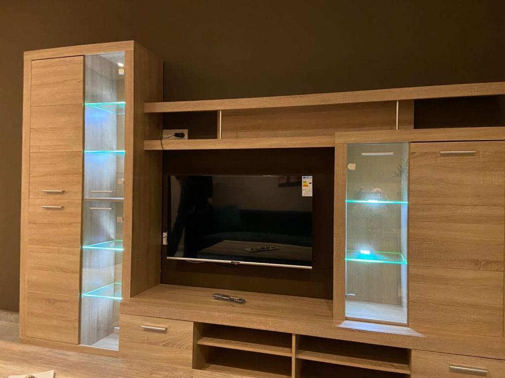TV a/nebo společenská místnost v ubytování Atlas-Résidence by Rent-Inn