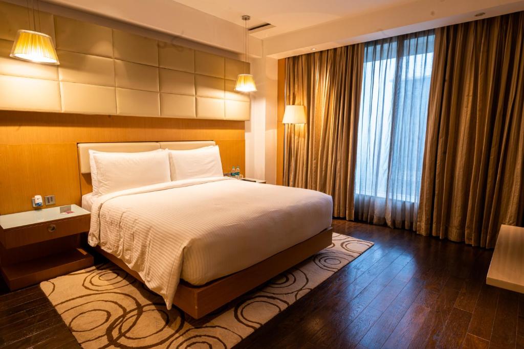 Postel nebo postele na pokoji v ubytování Crowne Plaza Greater Noida by IHG