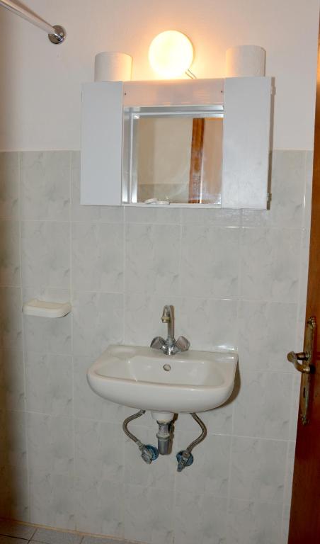 Koupelna v ubytování Hotel Atsitsa