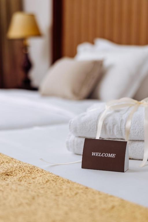Letto o letti in una camera di Garni Hotel Planeta Inn