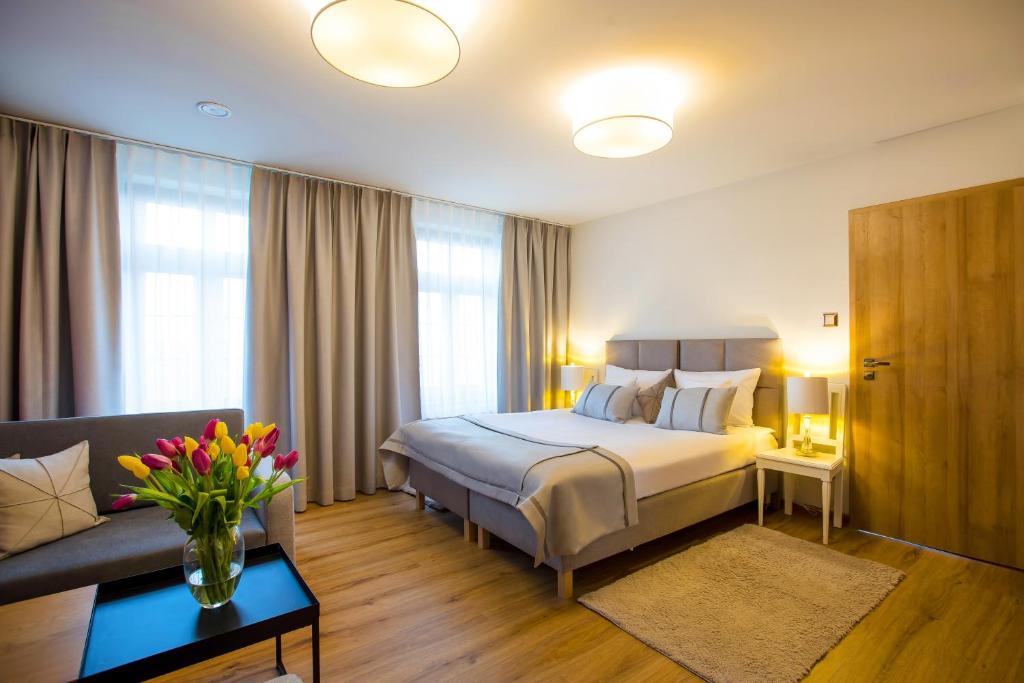 Posteľ alebo postele v izbe v ubytovaní Hotel i Restauracja na Skarpie