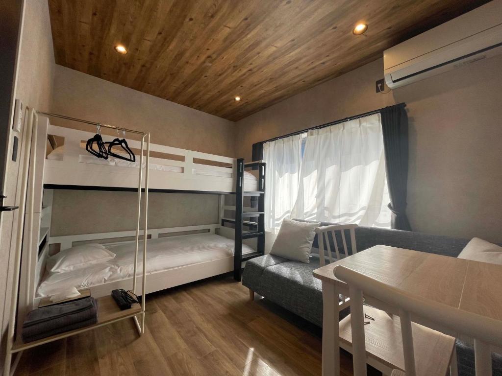 Postel nebo postele na pokoji v ubytování TOCORO. Mt.Fuji Station HOSTEL Kawaguchiko
