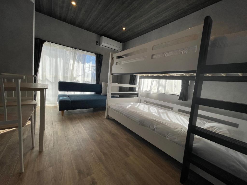 Postel nebo postele na pokoji v ubytování TOCORO. Mt.Fuji Station HOSTEL Kawaguchiko