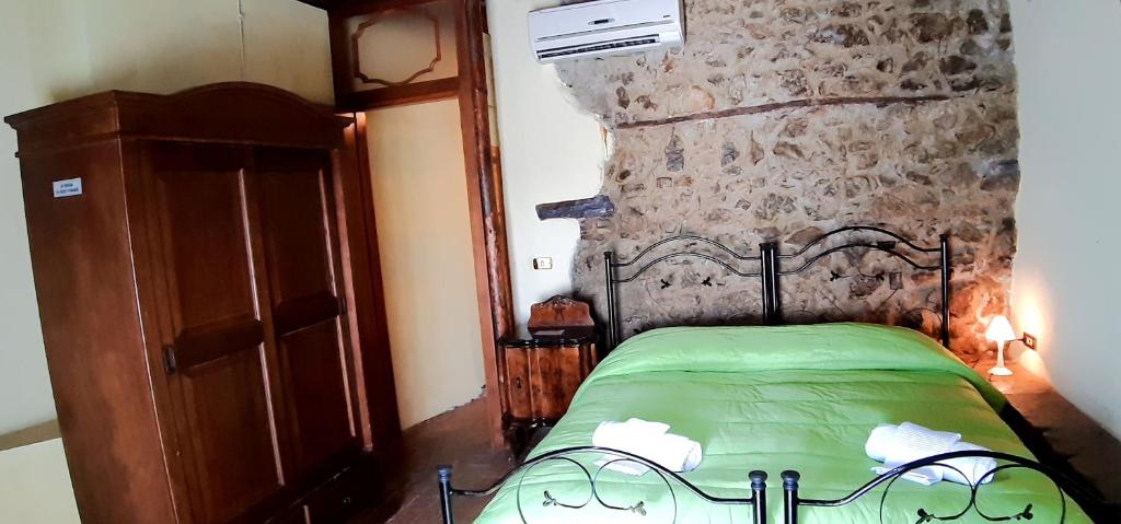 Postel nebo postele na pokoji v ubytování Il Castello