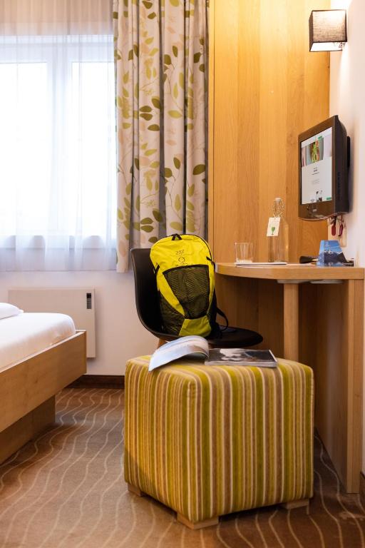 Postel nebo postele na pokoji v ubytování Hotel Grüner Baum