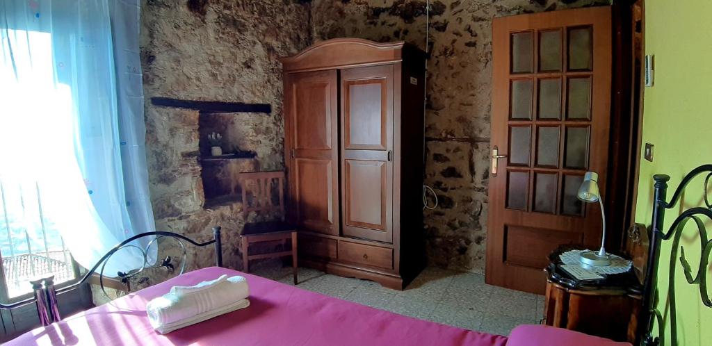 Postel nebo postele na pokoji v ubytování Il Castello