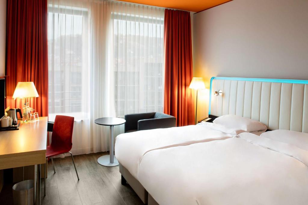 Postel nebo postele na pokoji v ubytování Park Inn by Radisson Stuttgart
