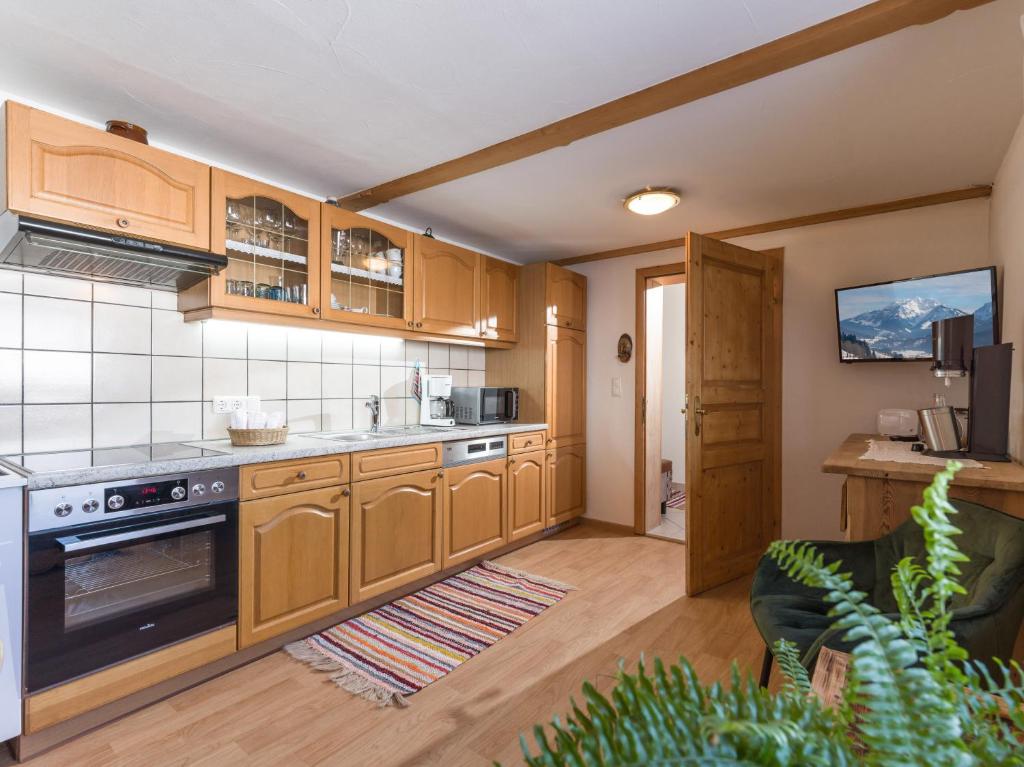 Kuchyň nebo kuchyňský kout v ubytování Sunnseit Lodge - Kitzbüheler Alpen