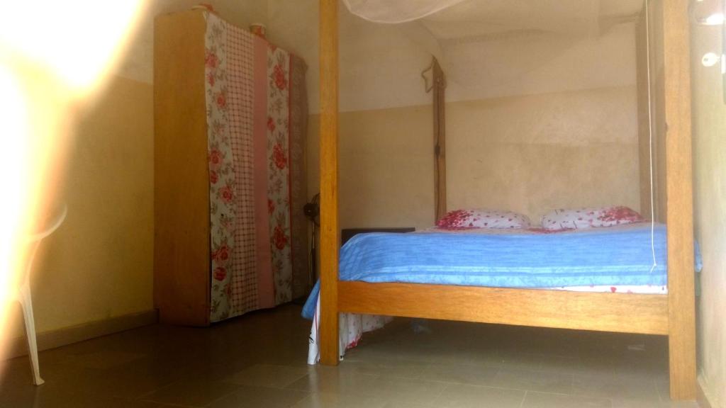 Giường trong phòng chung tại ESPACE COLIBRI
