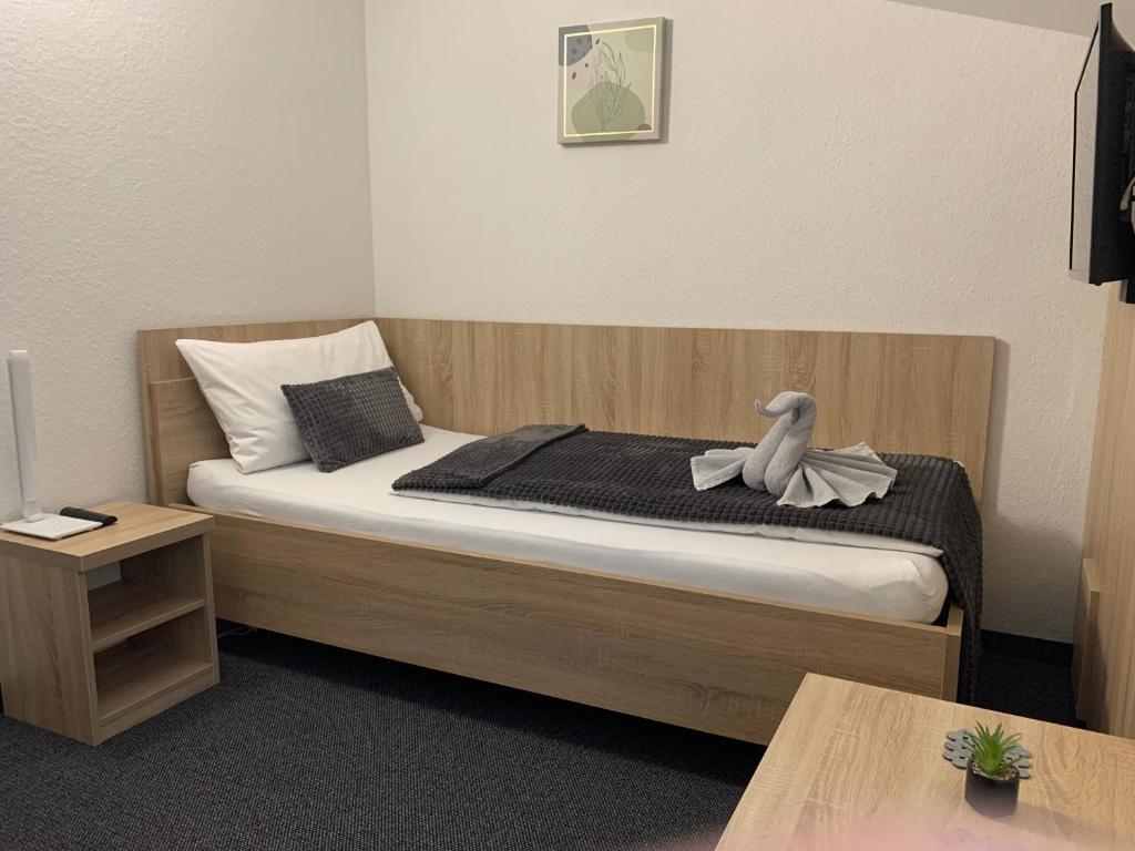Postel nebo postele na pokoji v ubytování Pension 1310