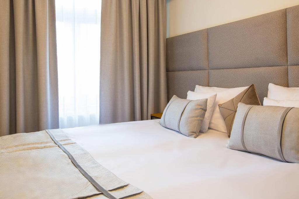 Posteľ alebo postele v izbe v ubytovaní Hotel i Restauracja na Skarpie