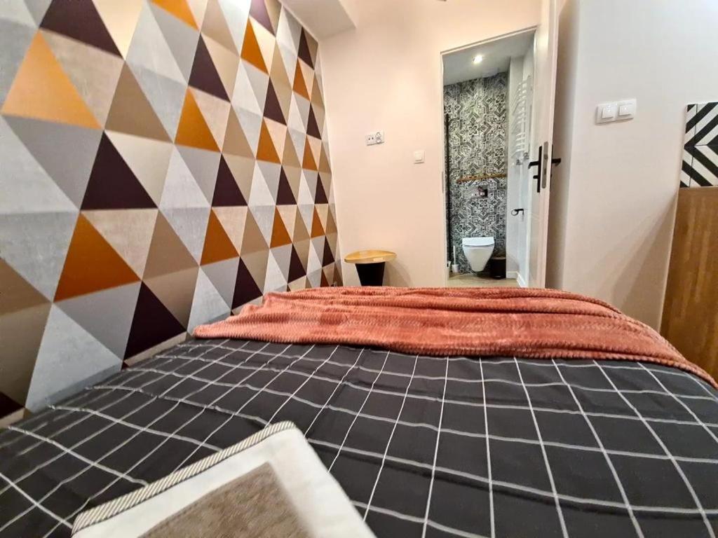 Posteľ alebo postele v izbe v ubytovaní APARTAMENT WILEŃSKA #free parking, self check-in