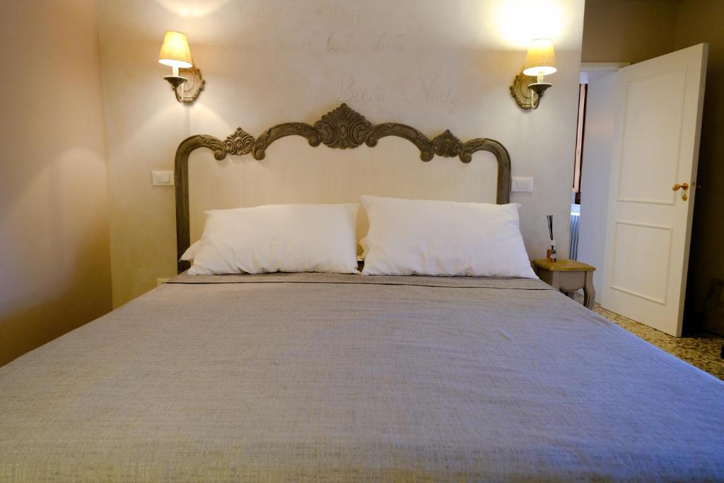 Posteľ alebo postele v izbe v ubytovaní la Casa di Francesco e Rosina