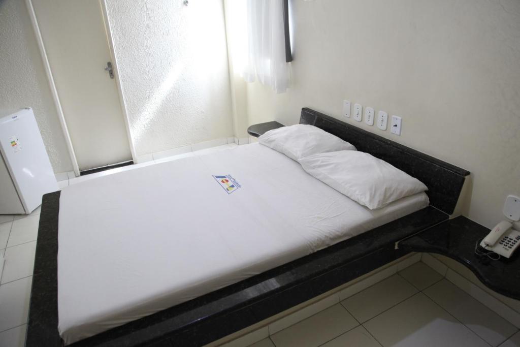 Postel nebo postele na pokoji v ubytování Hotel Piramide - Dois de Julho (Adult Only)