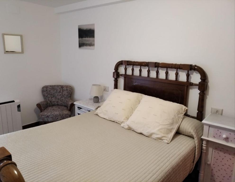 Llit o llits en una habitació de Casa Laguiñas en Castro Caldelas