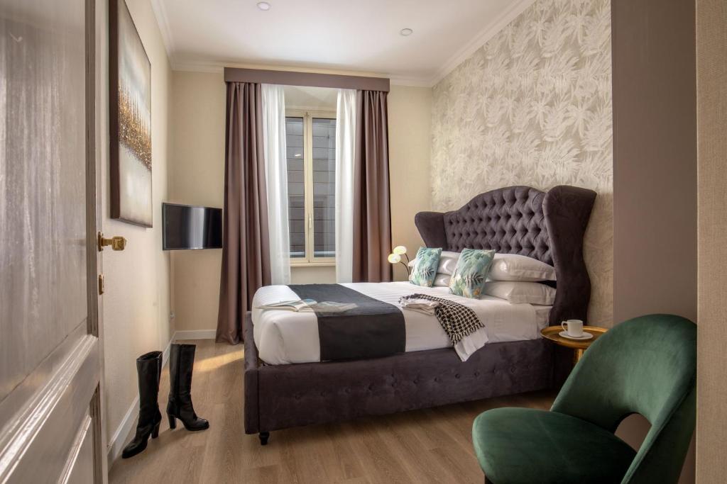 Posteľ alebo postele v izbe v ubytovaní Spanish Steps Victoria Apartment