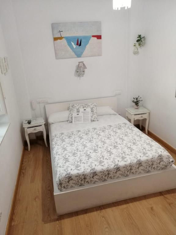 Posteľ alebo postele v izbe v ubytovaní Un Patio al Sur