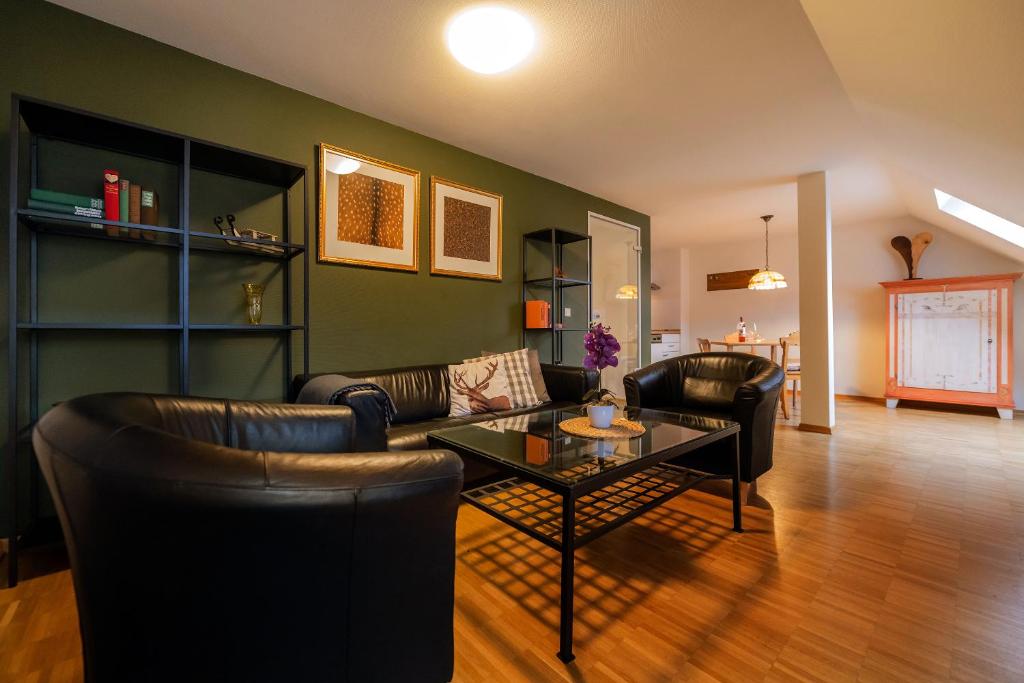 Posezení v ubytování Apparthotel Bad Schandau by STEIGER Hotels