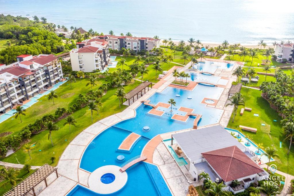 an aerial view of the pool at the resort at Luxury Condos at Mareazul Beachfront Complex with Resort-Style Amenities in Playa del Carmen