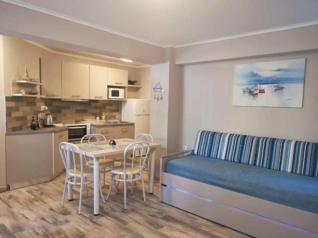 Η κουζίνα ή μικρή κουζίνα στο Amaranti Luxury Apartments