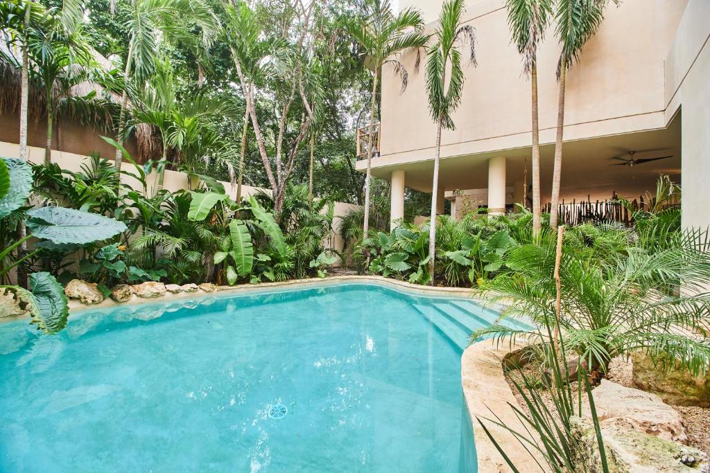 Spectacular & Tropical Apartment in Tulum with a 500 Sq Ft Terrace, Hammock, Private Plunge Pool and Fancy Amenities