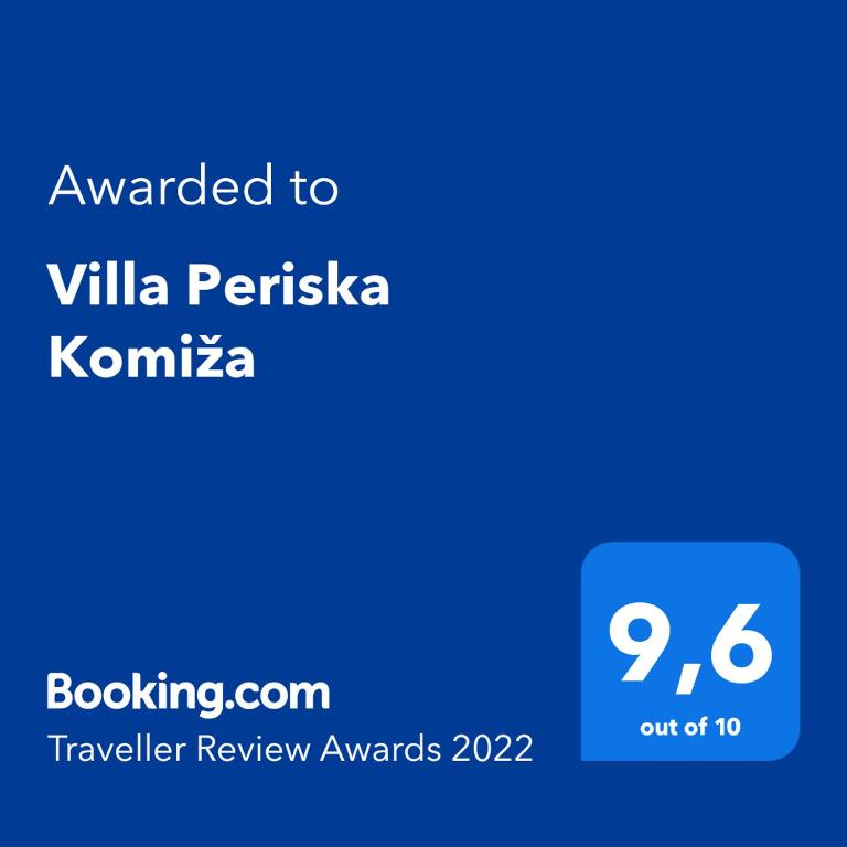 a screenshot of a cell phone with the text awarded to villa perilla k at Villa Periska Komiža in Komiža