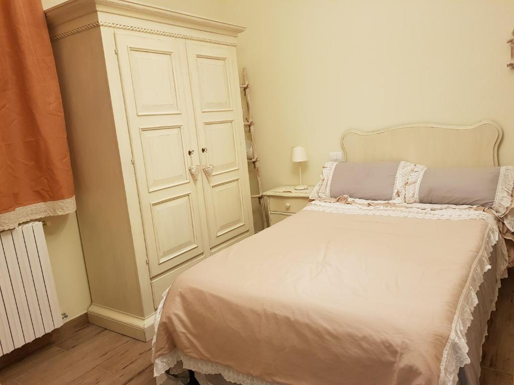 Posteľ alebo postele v izbe v ubytovaní Casale Cisanello