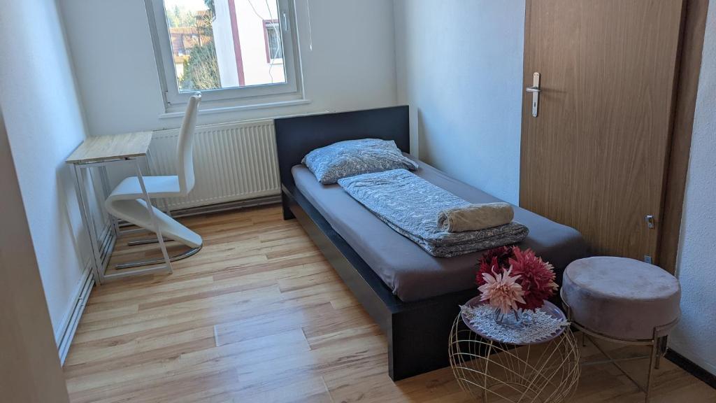 Ένα ή περισσότερα κρεβάτια σε δωμάτιο στο Single Room near the black forest