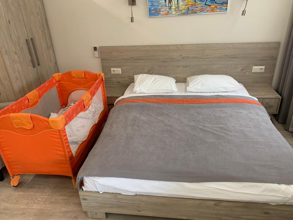 Postel nebo postele na pokoji v ubytování Summit Apart Hotel
