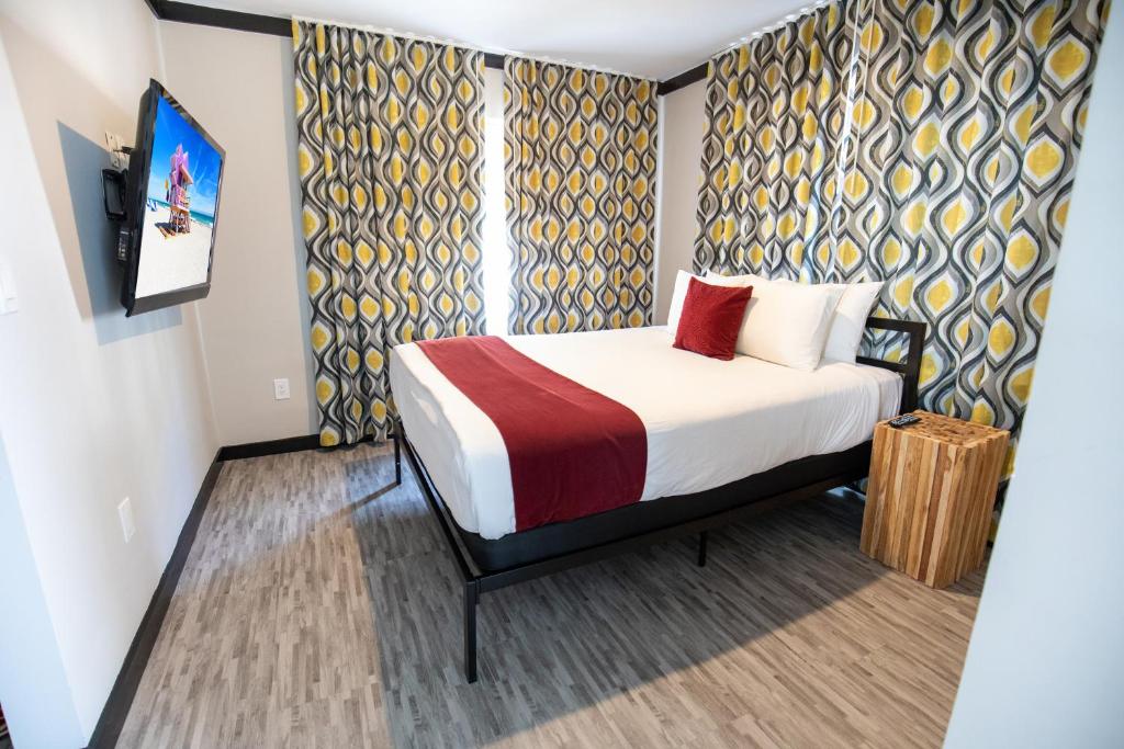 Postel nebo postele na pokoji v ubytování Metropole Suites South Beach