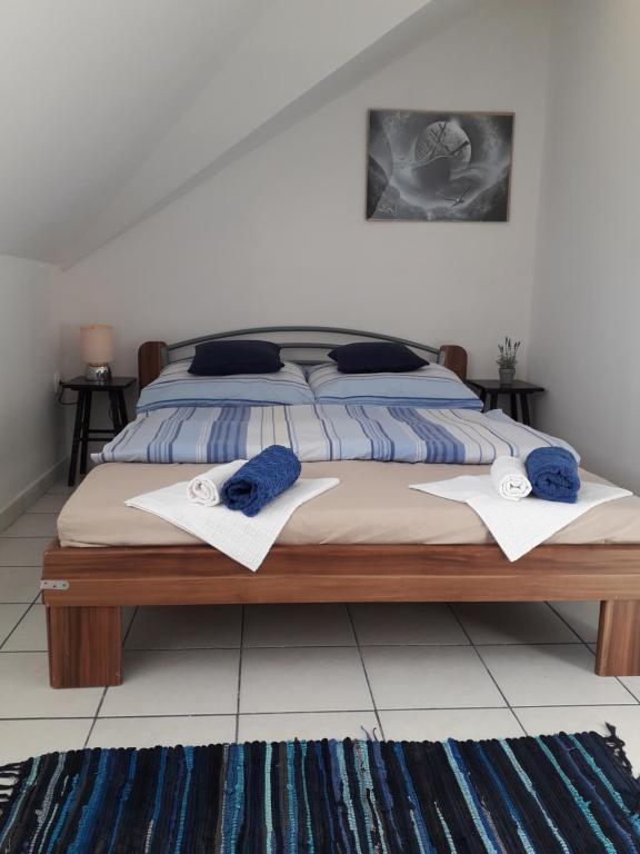 Postel nebo postele na pokoji v ubytování Béke Stúdió Apartman
