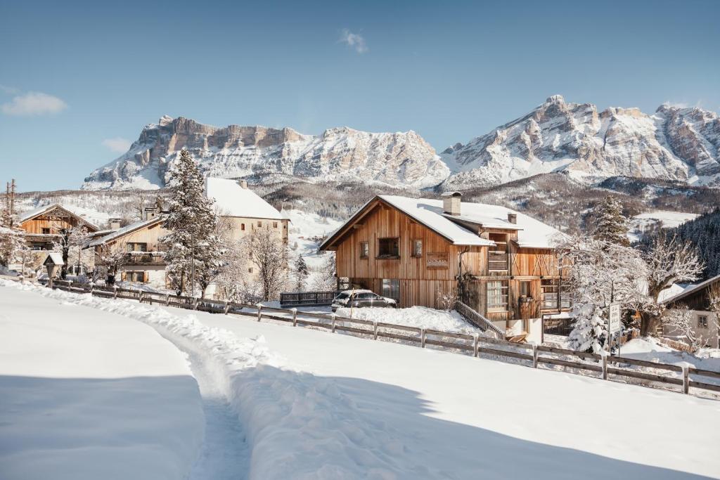 a winter view of a village in the mountains at Apartment Sotmarin in La Villa