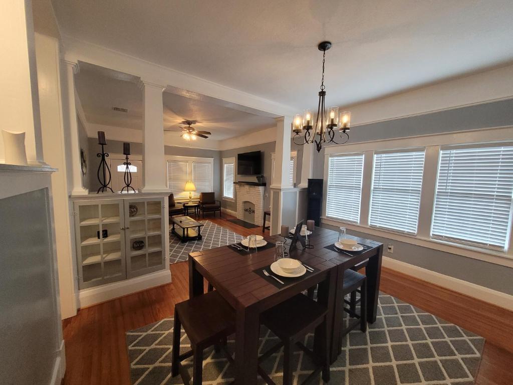a kitchen and dining room with a table and chairs at Modern Two Bedroom Home in Lakeland