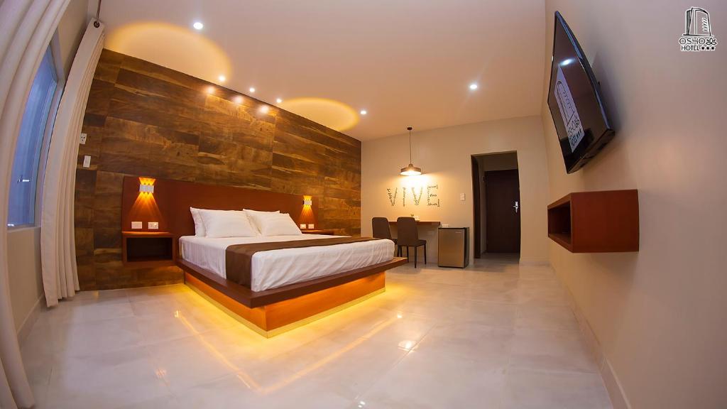Кровать или кровати в номере HOTEL OSHO