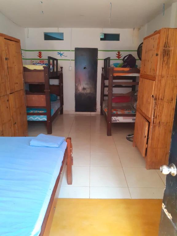 Postel nebo postele na pokoji v ubytování Palomino Hostel