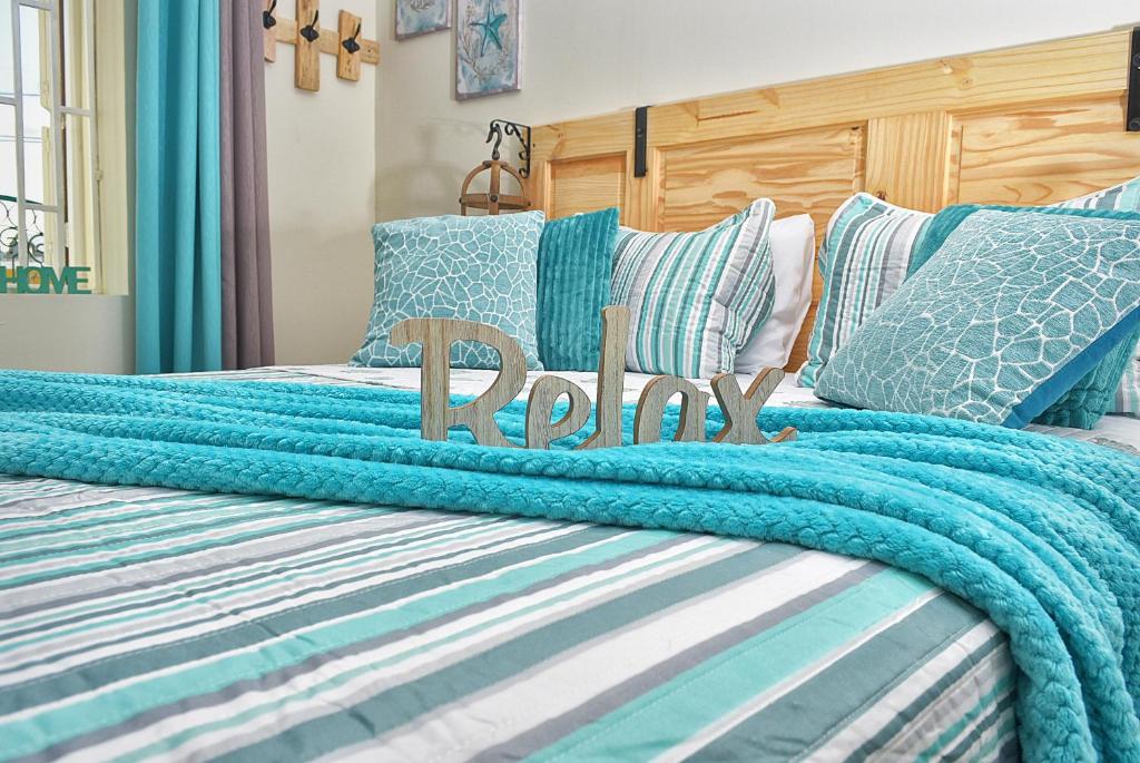 Postel nebo postele na pokoji v ubytování Turquoise B&B