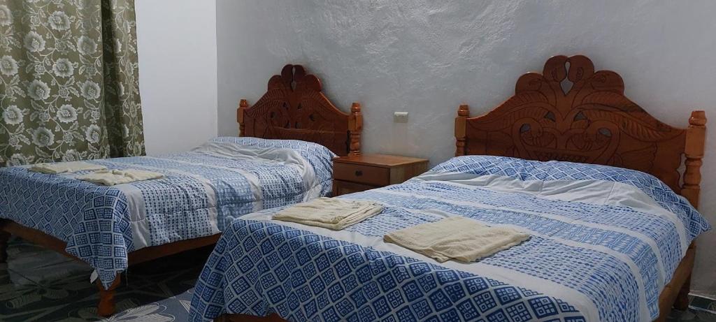 Postel nebo postele na pokoji v ubytování Cabaña Sak Ja Selva Lacandona