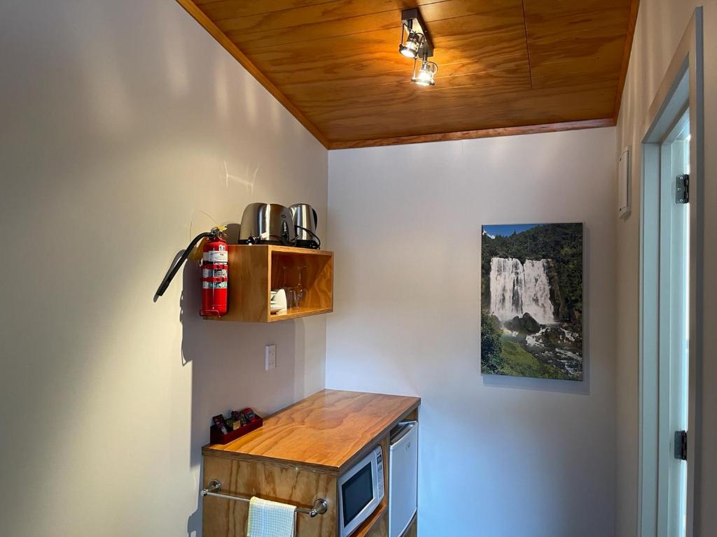 Kuchyň nebo kuchyňský kout v ubytování Waitomo Lodge