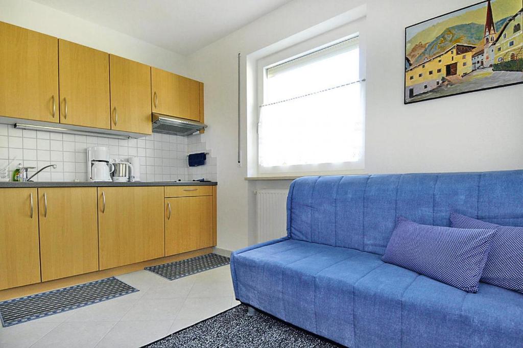 Kuchyň nebo kuchyňský kout v ubytování Apartment in Schlanders near Stelvio Park